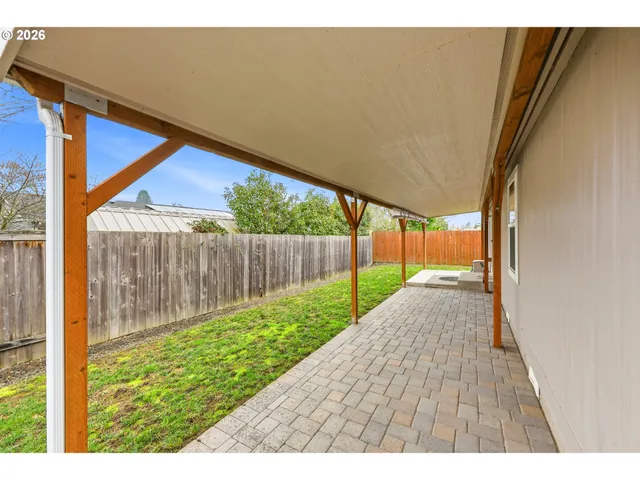 a view of backyard with green space