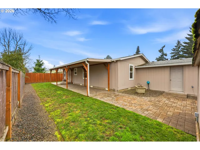 a view of a backyard with a house
