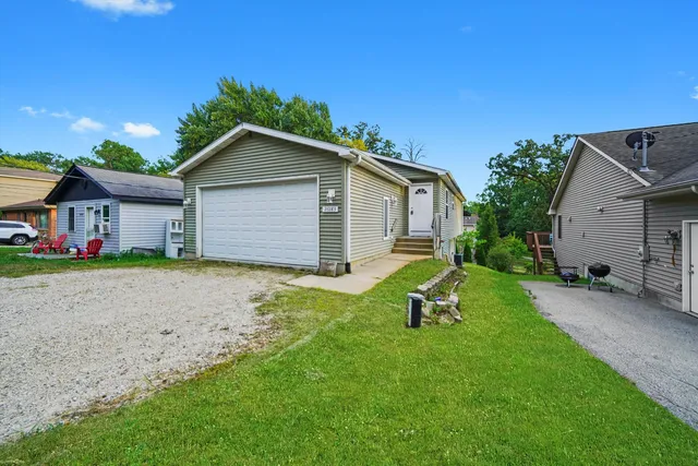 a house view with a garden space