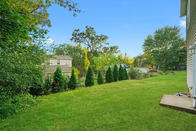 a view of a backyard with a garden