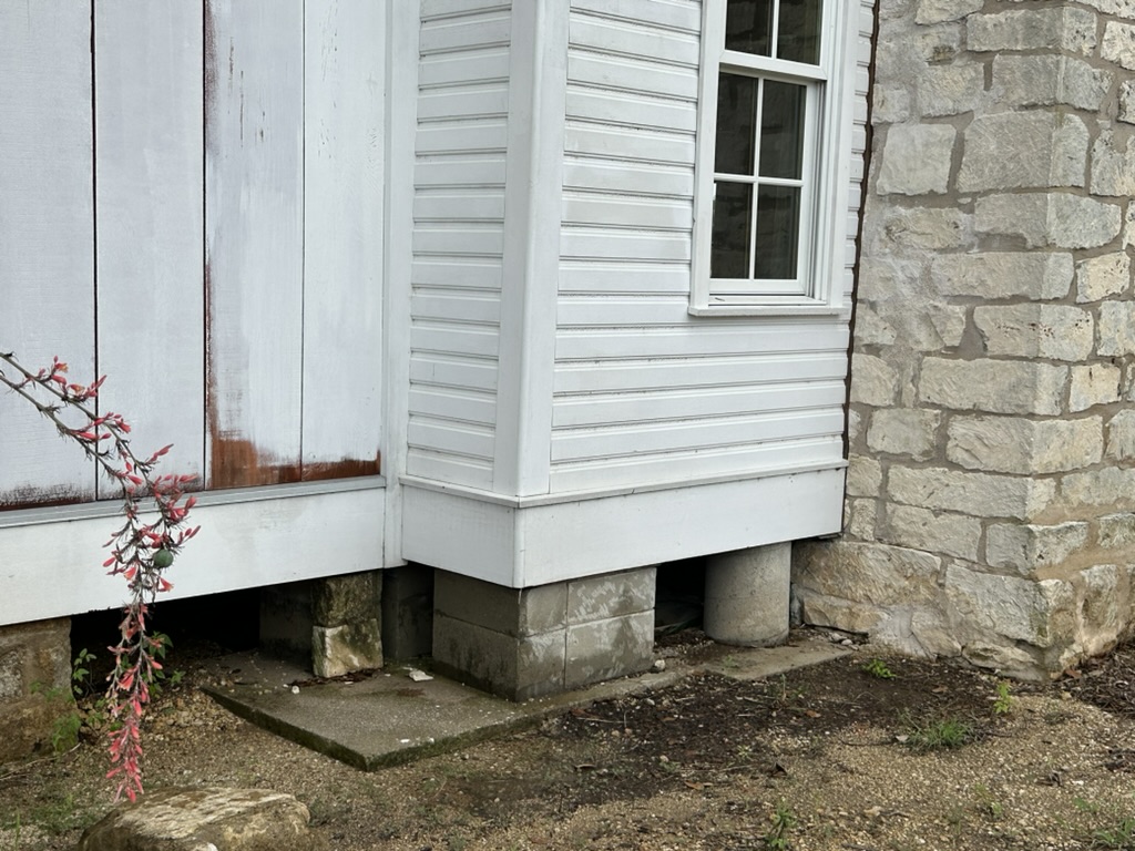 600 South Bagdad Road Leander, TX 78641 - Photo 34 of 36 area by chimneys, stone on site to cover