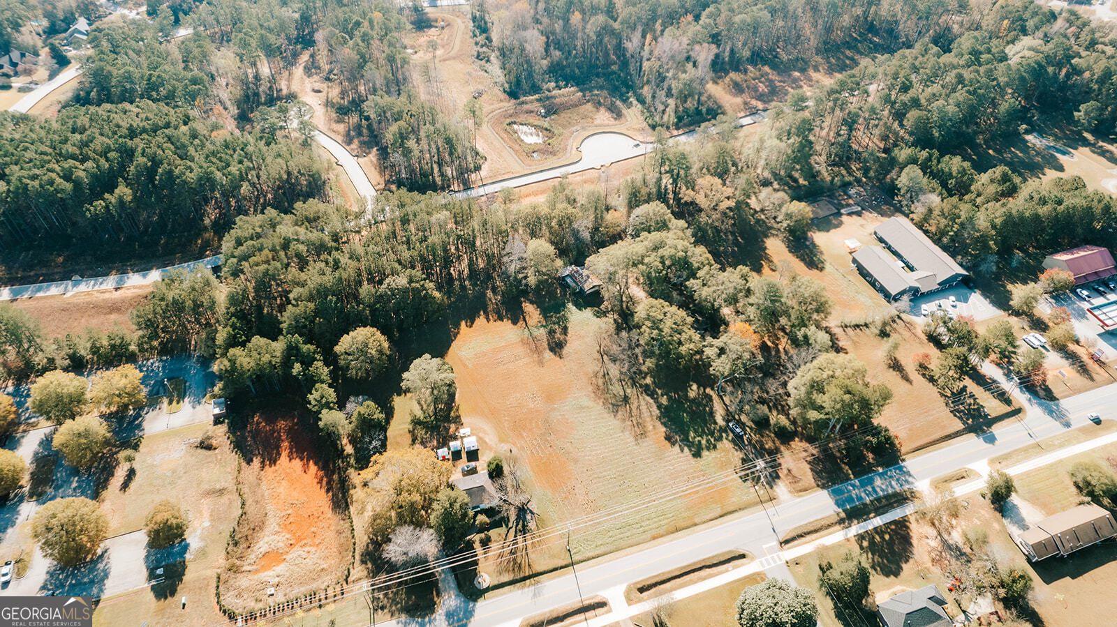 1921 Hog Mountain Road Watkinsville, GA 30677 - Photo 3 of 9 a view of a tree in front of house
