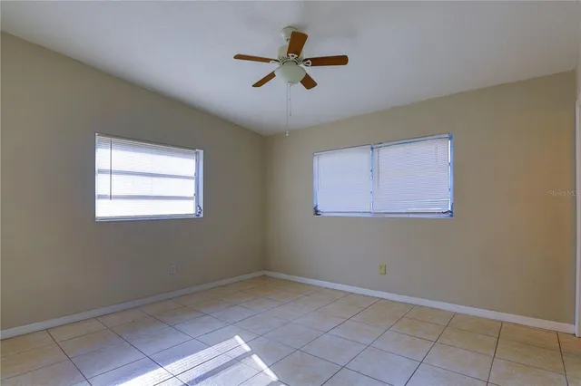 a view of a ceiling fan in a room