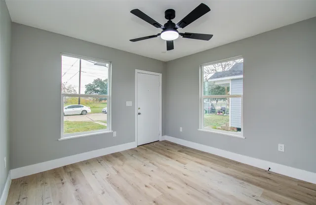 a view of an empty room and window