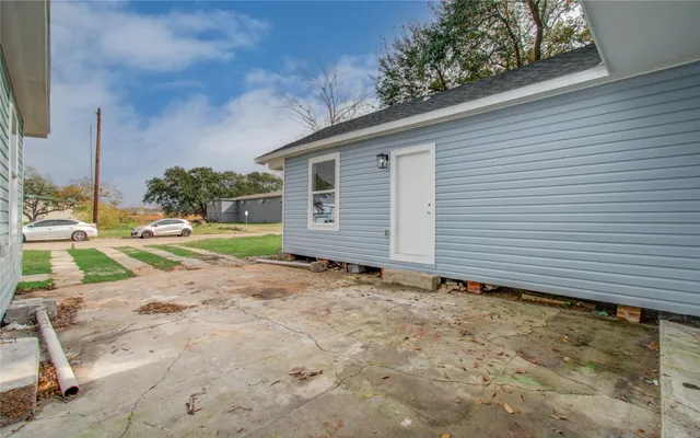 a view of a backyard with plants