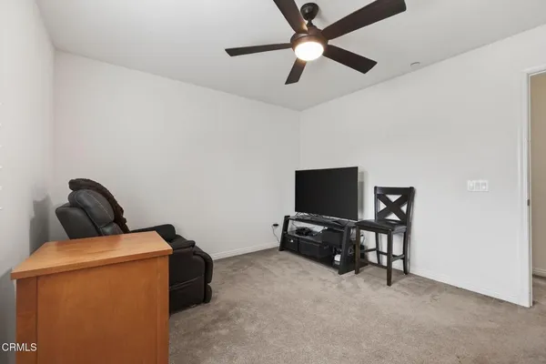 a view of workspace with lounge chair
