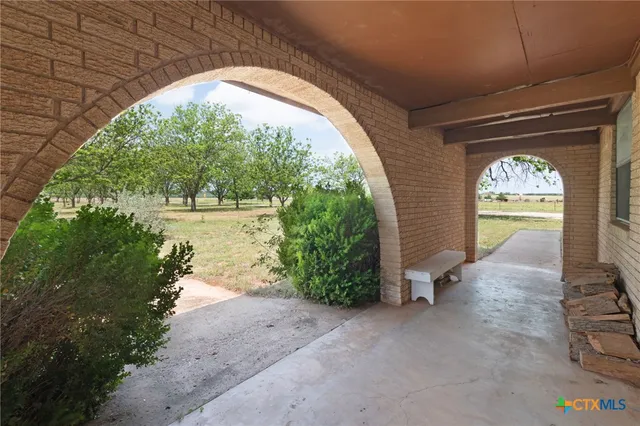a view of a room with a fireplace