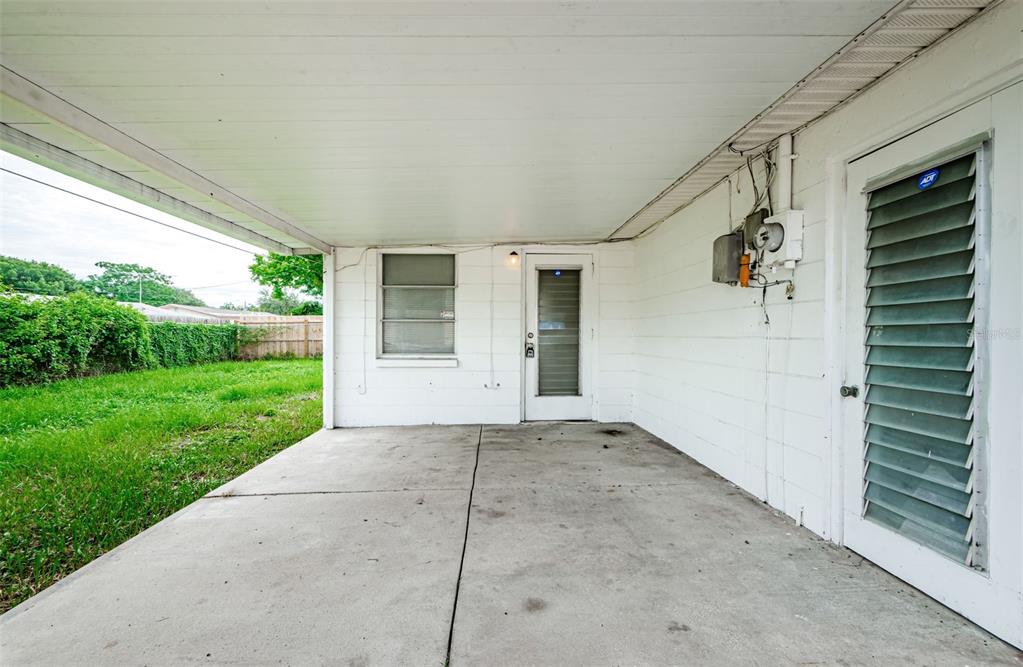 4709 Manor Drive New Port Richey, FL 34652 - Photo 24 of 31 Rear Porch