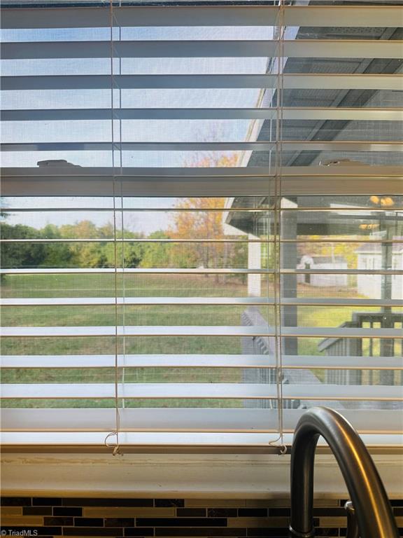 8440 West Harrell Road Oak Ridge, NC 27310 - Photo 47 of 50 Kitchen sink overlooks backyard