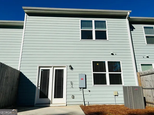 a view of entrance gate of the house