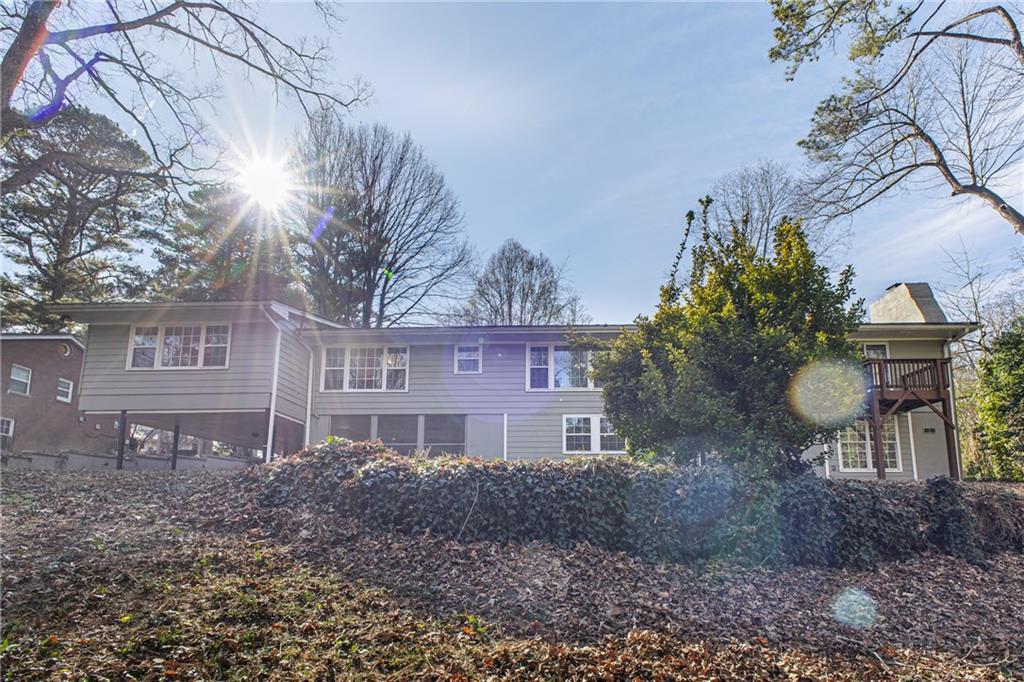 187 Old Timber Road Lawrenceville, GA 30046 - Photo 29 of 32 a front view of house with a garden
