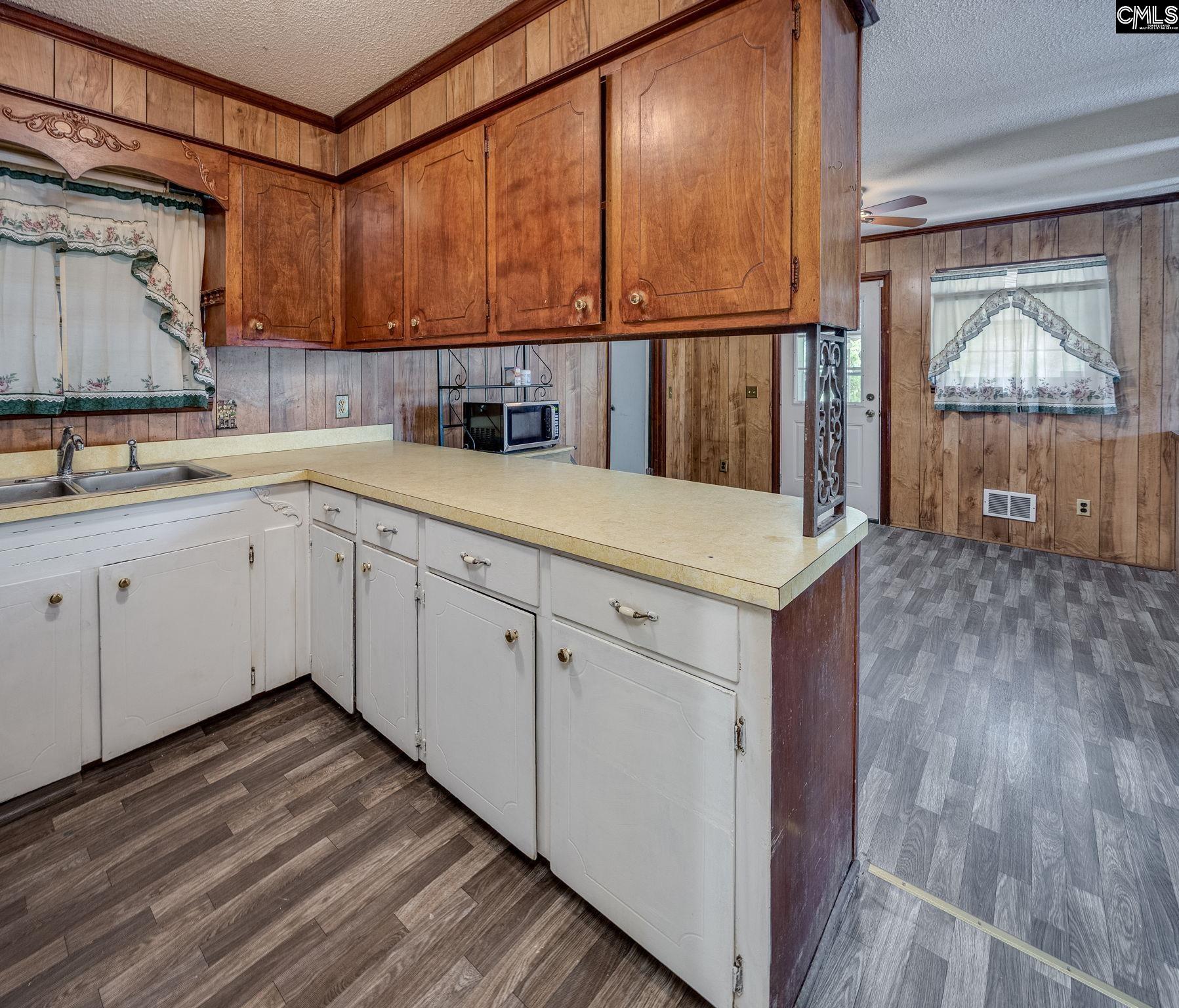 5666 Middleton Court Columbia, SC 29203 - Photo 21 of 42 a kitchen with a sink and cabinets