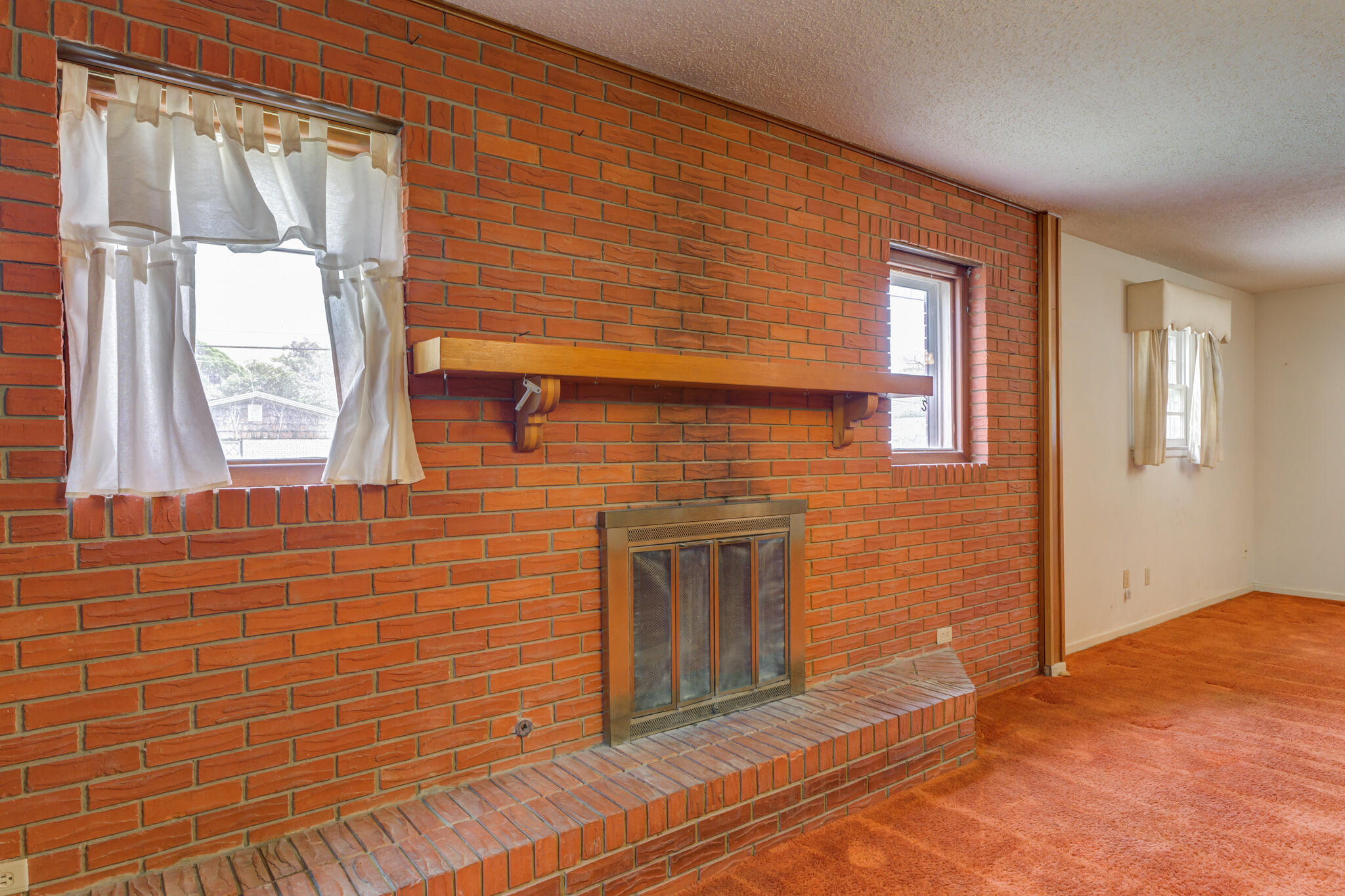 5502 8th Street Lubbock, TX 79416 - Photo 11 of 37 a view of empty room with windows