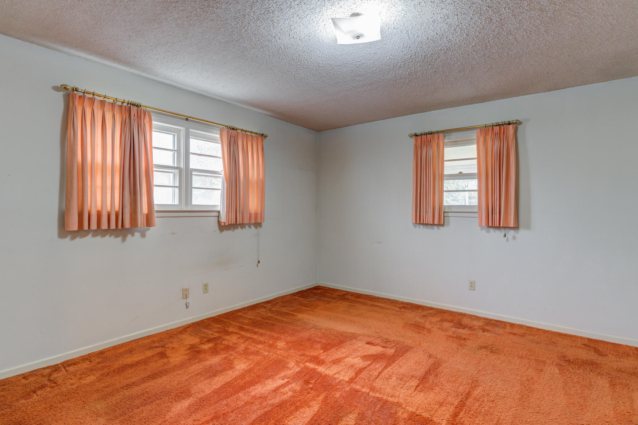 5502 8th Street Lubbock, TX 79416 - Photo 27 of 37 an empty room with a window