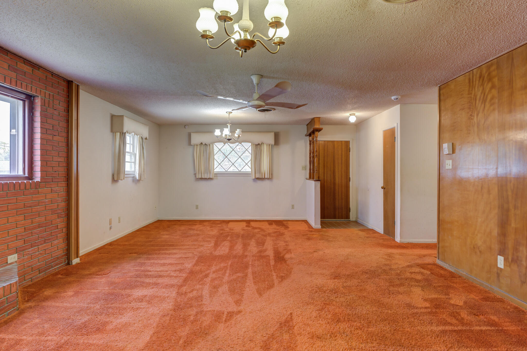 5502 8th Street Lubbock, TX 79416 - Photo 10 of 37 a view of an empty room with a window