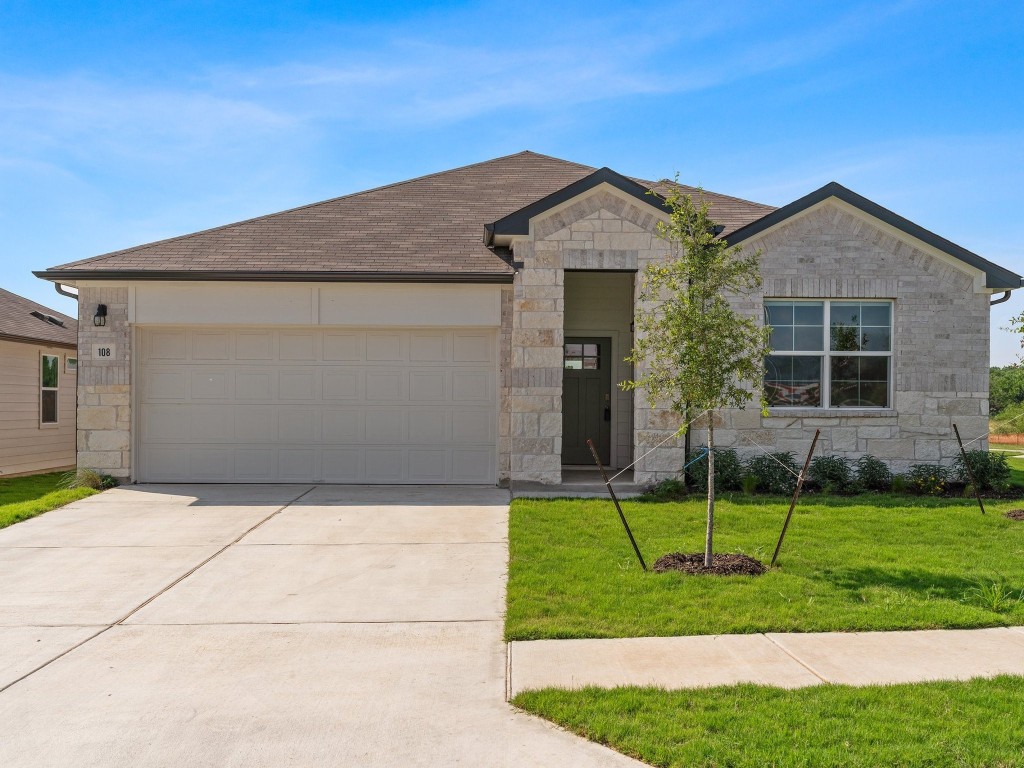 108 Windmill Palm Drive Kyle, TX 78640 - Photo 1 of 1 a front view of a house with a yard