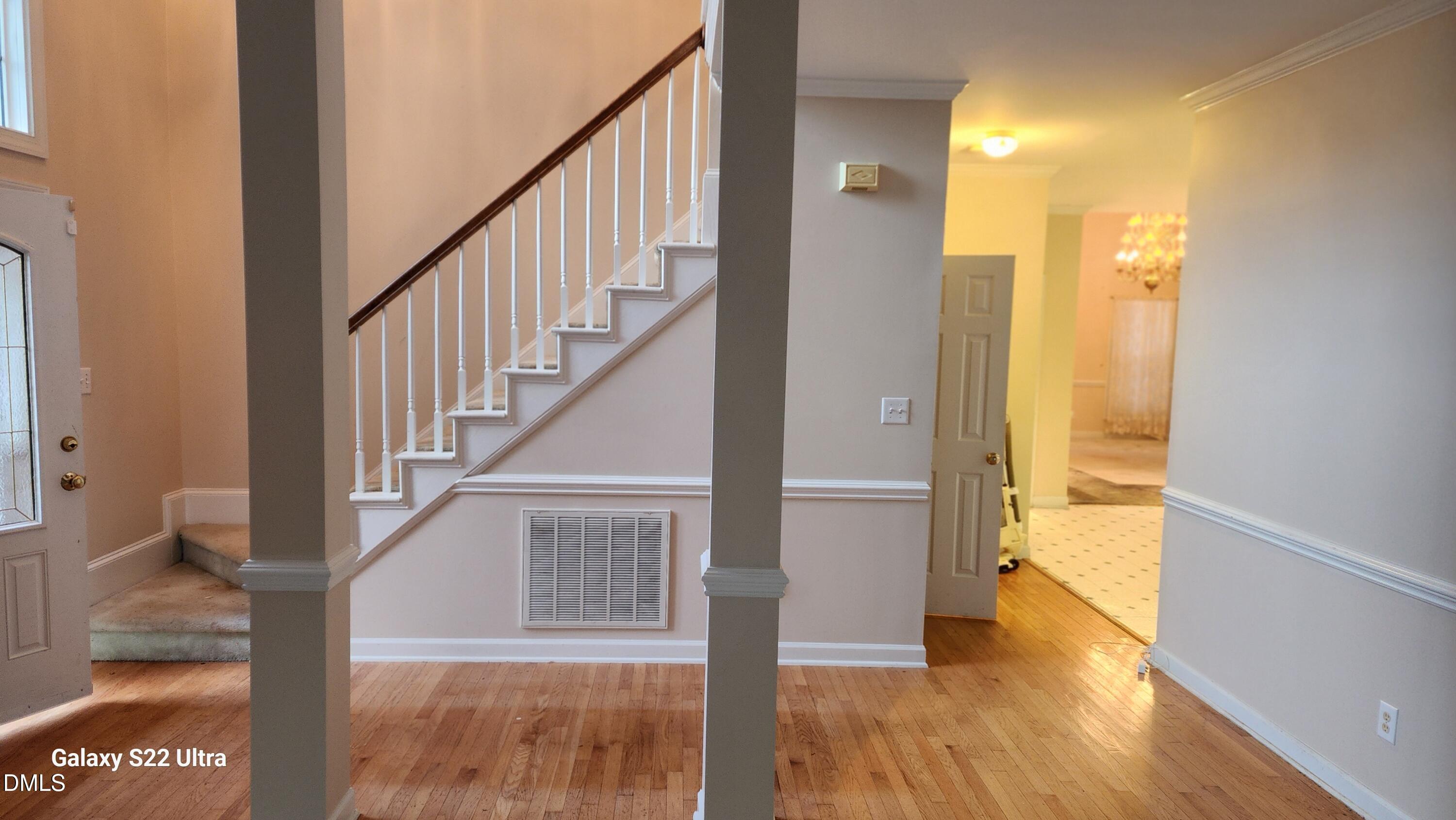 1 Haycox Court Durham, NC 27713 - Photo 7 of 91 a view of entryway and hall with wooden floor