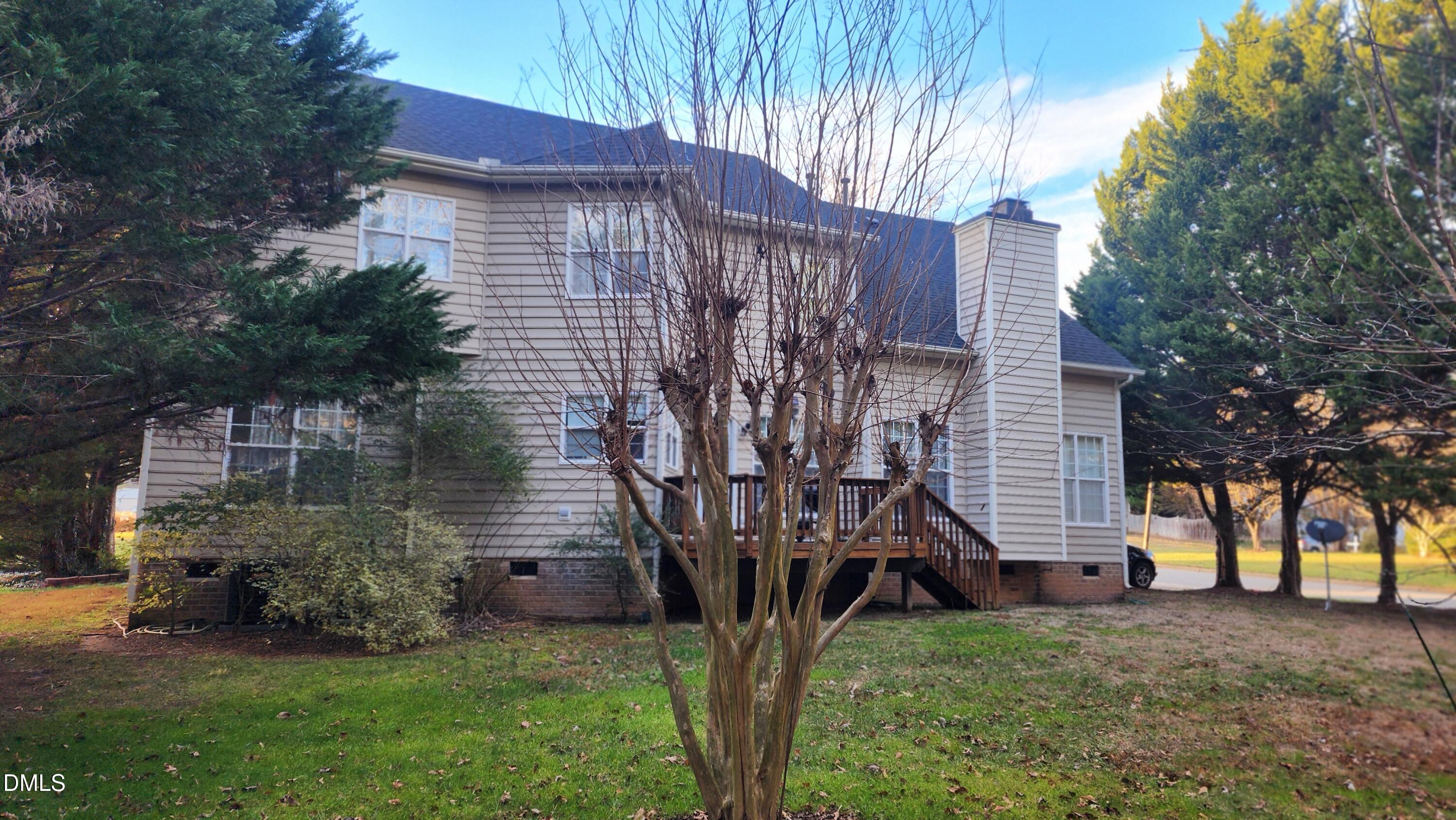 1 Haycox Court Durham, NC 27713 - Photo 29 of 91 a view of a wooden house with a yard