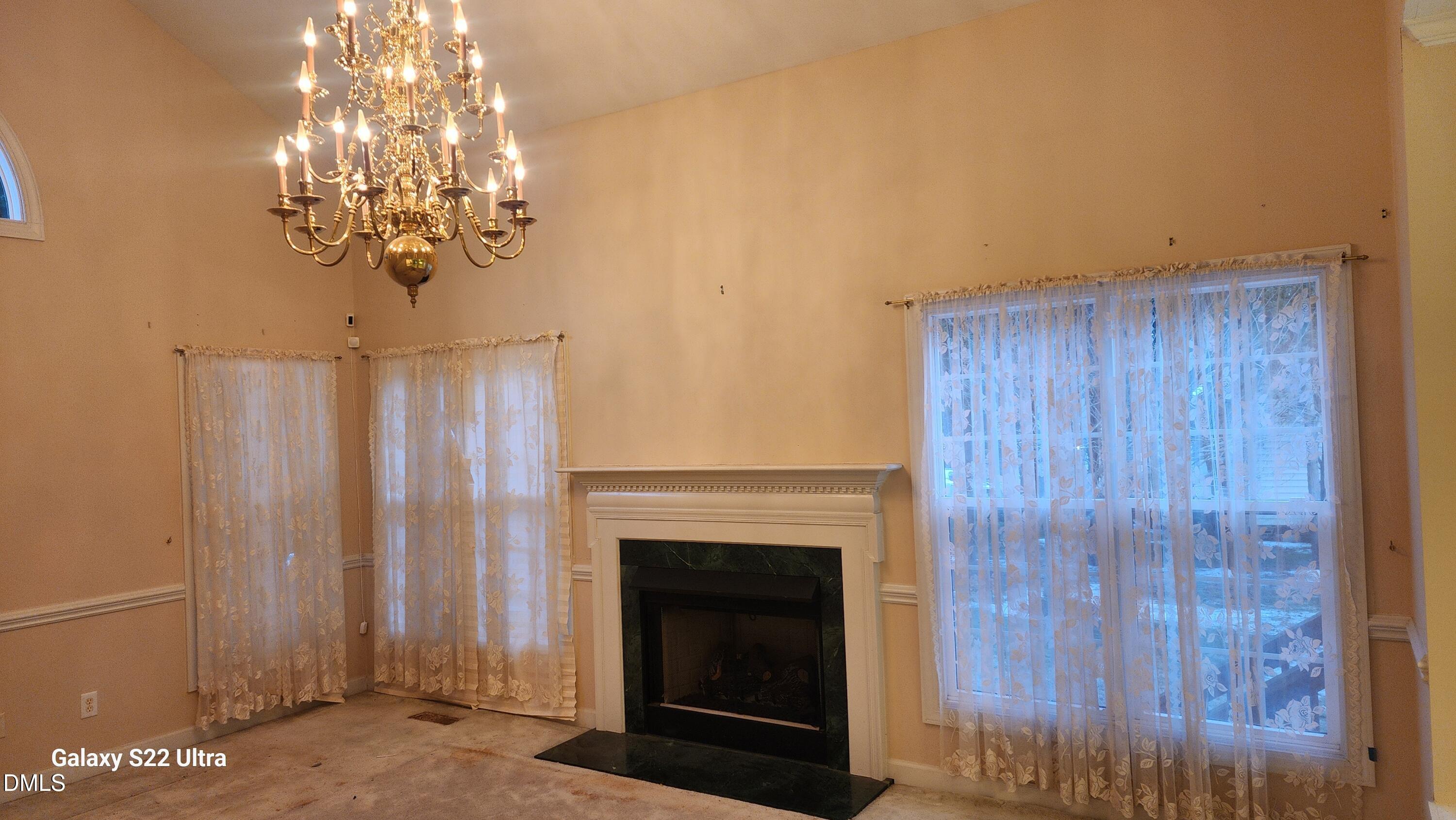 1 Haycox Court Durham, NC 27713 - Photo 60 of 91 a view of a livingroom with a fireplace