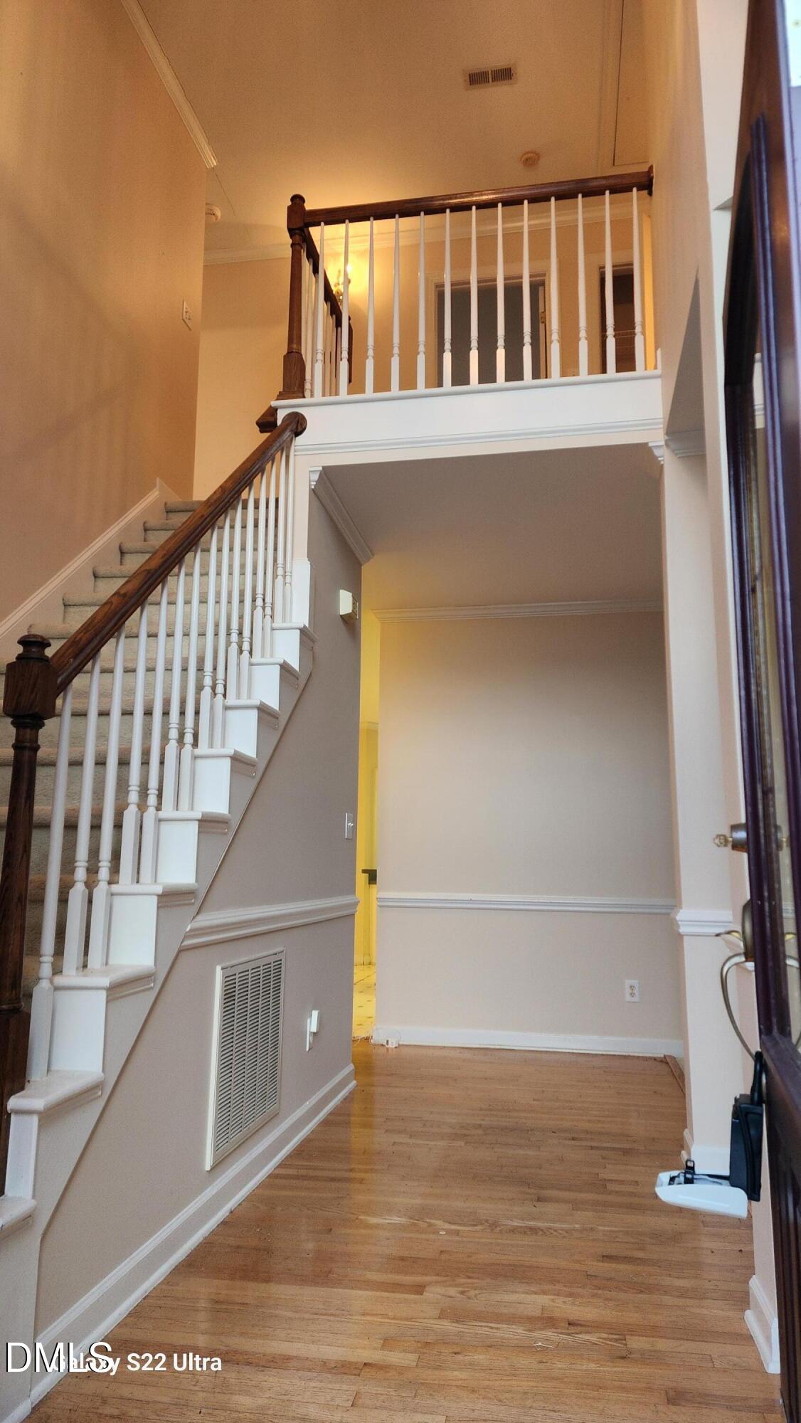 1 Haycox Court Durham, NC 27713 - Photo 5 of 91 a view of a big room with wooden floor and staircase