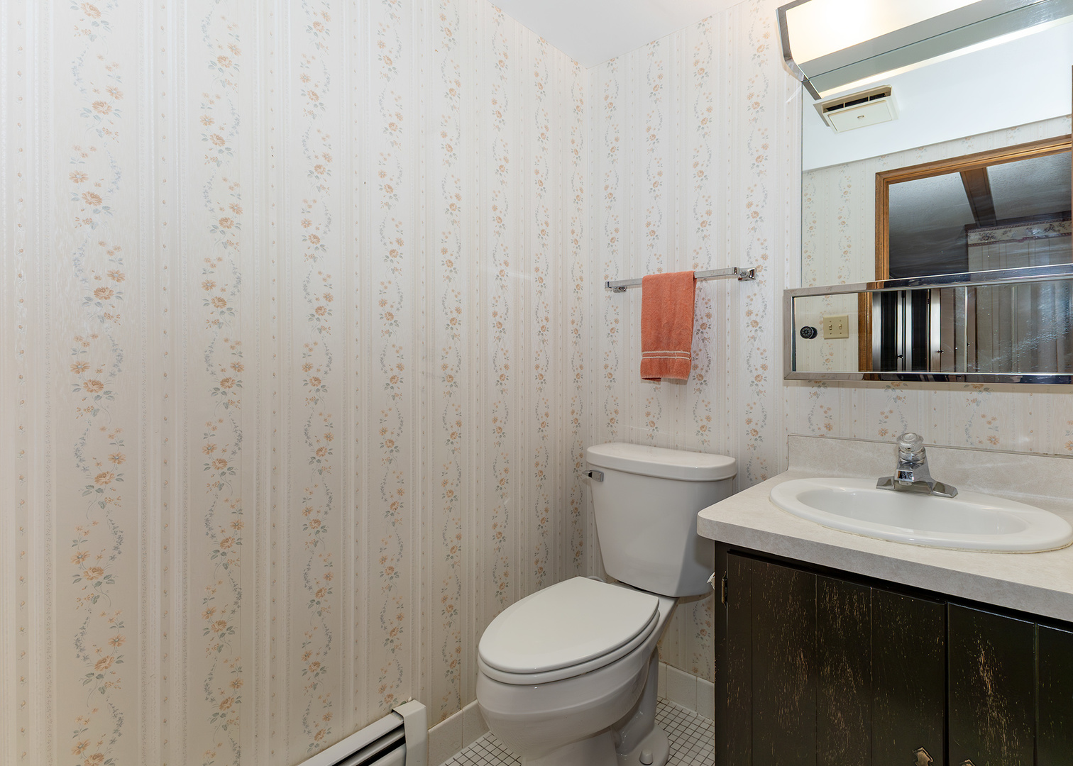 420 Margaret Street Atkinson, IL 61235 - Photo 23 of 26 a bathroom with a sink a toilet and mirror