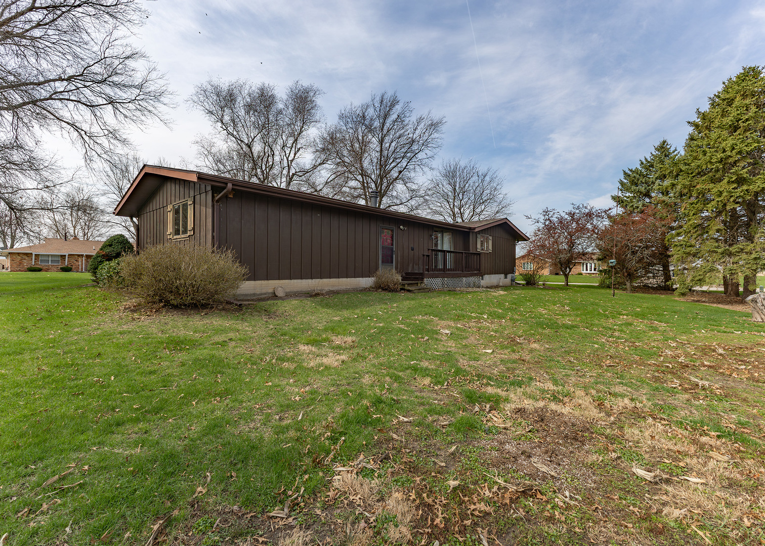 420 Margaret Street Atkinson, IL 61235 - Photo 5 of 26 a view of a house with a yard