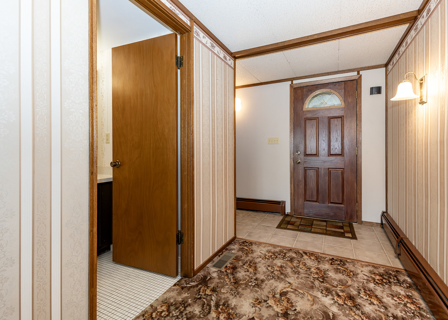 420 Margaret Street Atkinson, IL 61235 - Photo 6 of 26 a view of front door with a mirror
