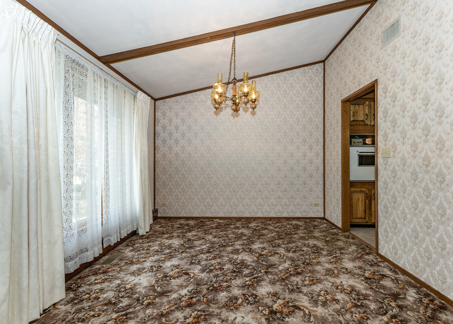 420 Margaret Street Atkinson, IL 61235 - Photo 9 of 26 a view of a back yard and a hallway