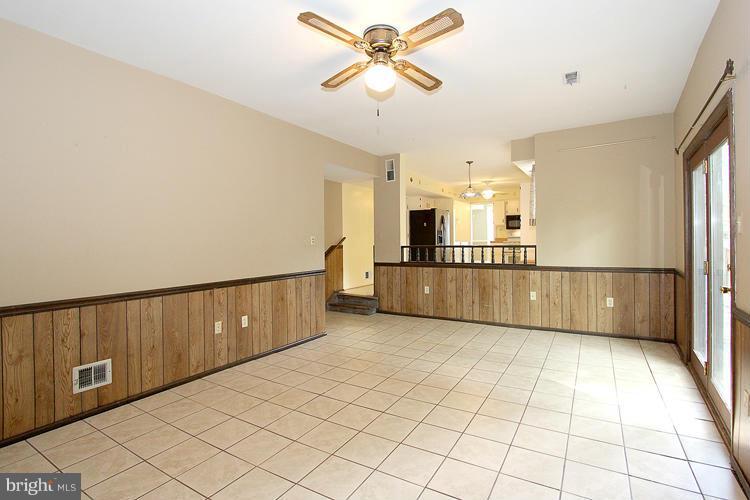 8955 Rolling Road Manassas, VA 20110 - Photo 12 of 30 a view of a kitchen with furniture and a kitchen view