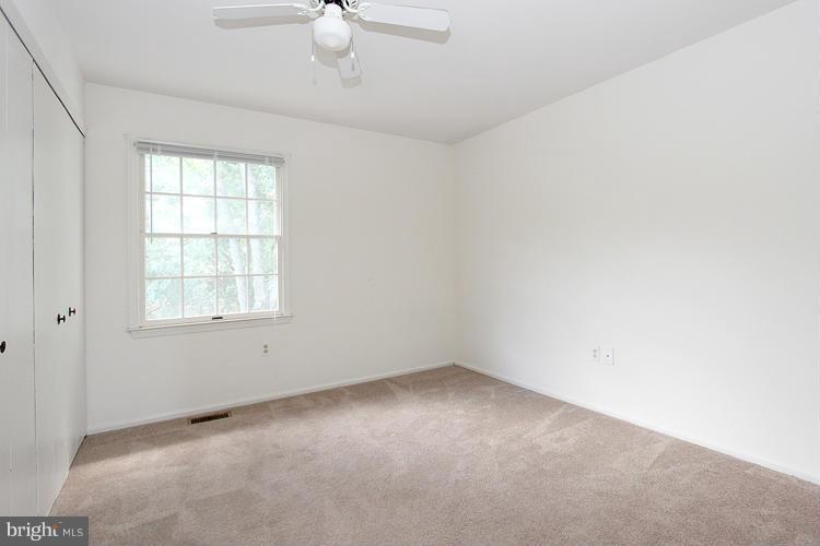 8955 Rolling Road Manassas, VA 20110 - Photo 14 of 30 an empty room with a window