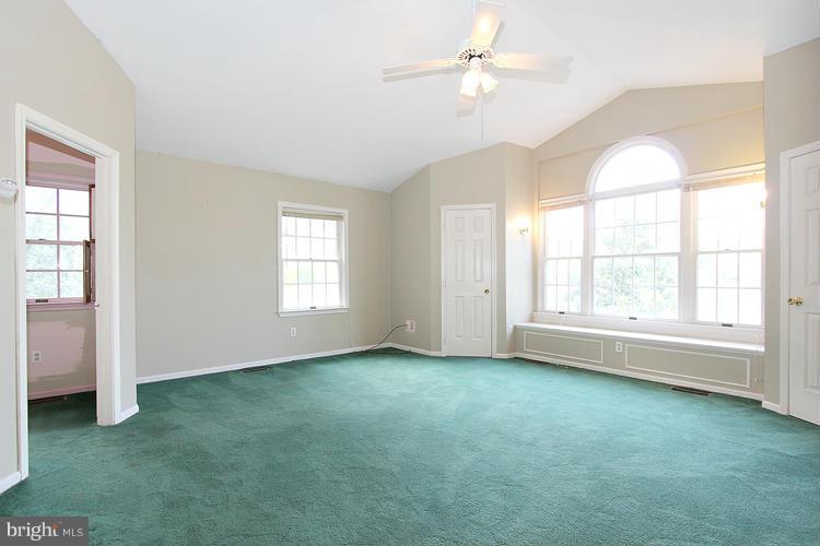8955 Rolling Road Manassas, VA 20110 - Photo 18 of 30 wooden floor in an empty room with a window