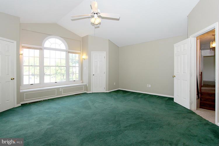 8955 Rolling Road Manassas, VA 20110 - Photo 19 of 30 a view of an empty room with a window