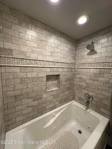 a bathroom with a bathtub