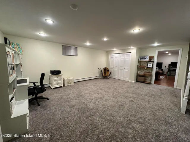 a view of a big room with gym equipment