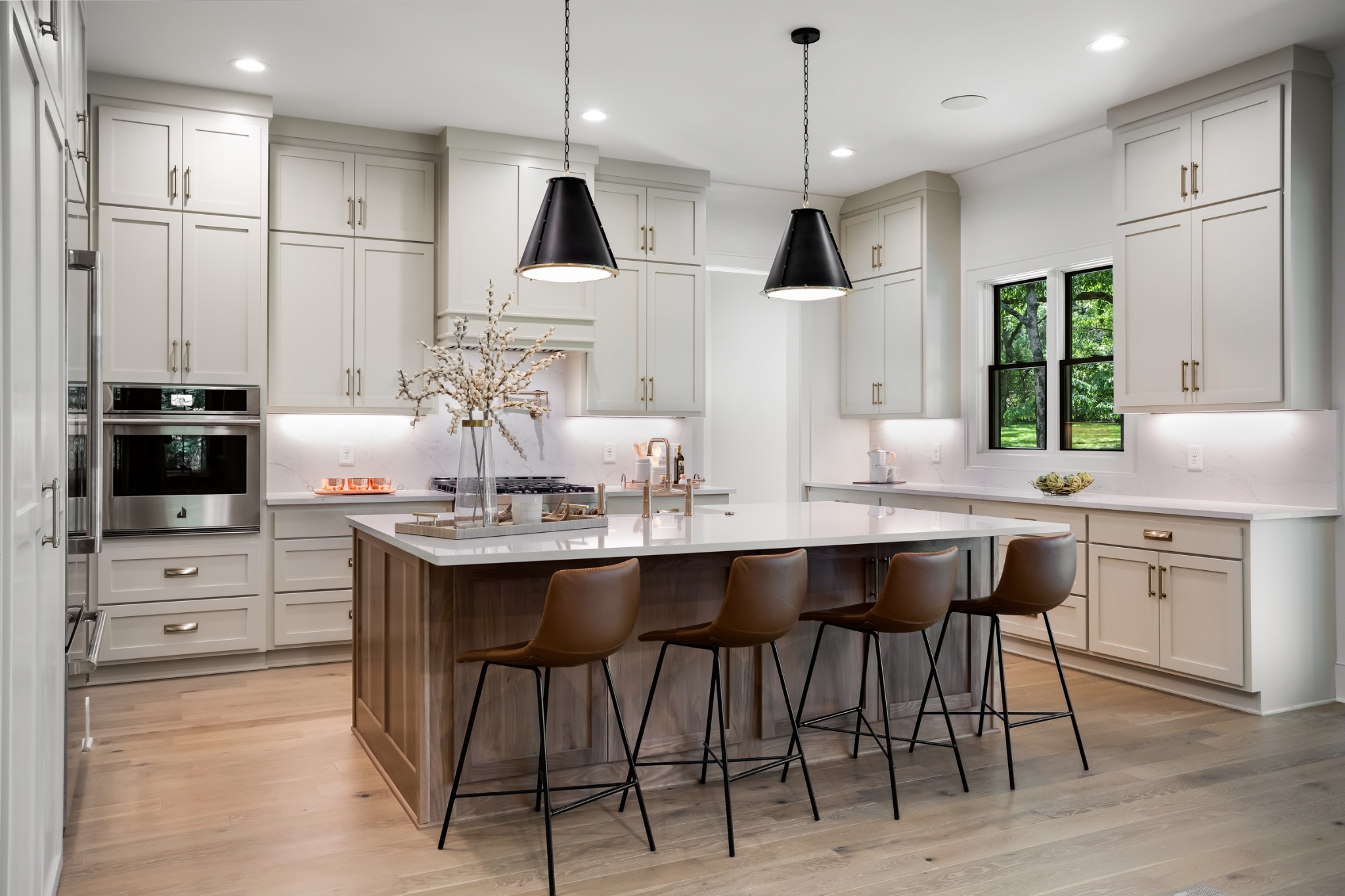 709 Brook Hollow Road Nashville, TN 37205 - Photo 14 of 55 a kitchen with stainless steel appliances granite countertop a sink a stove a refrigerator and island with wooden floor