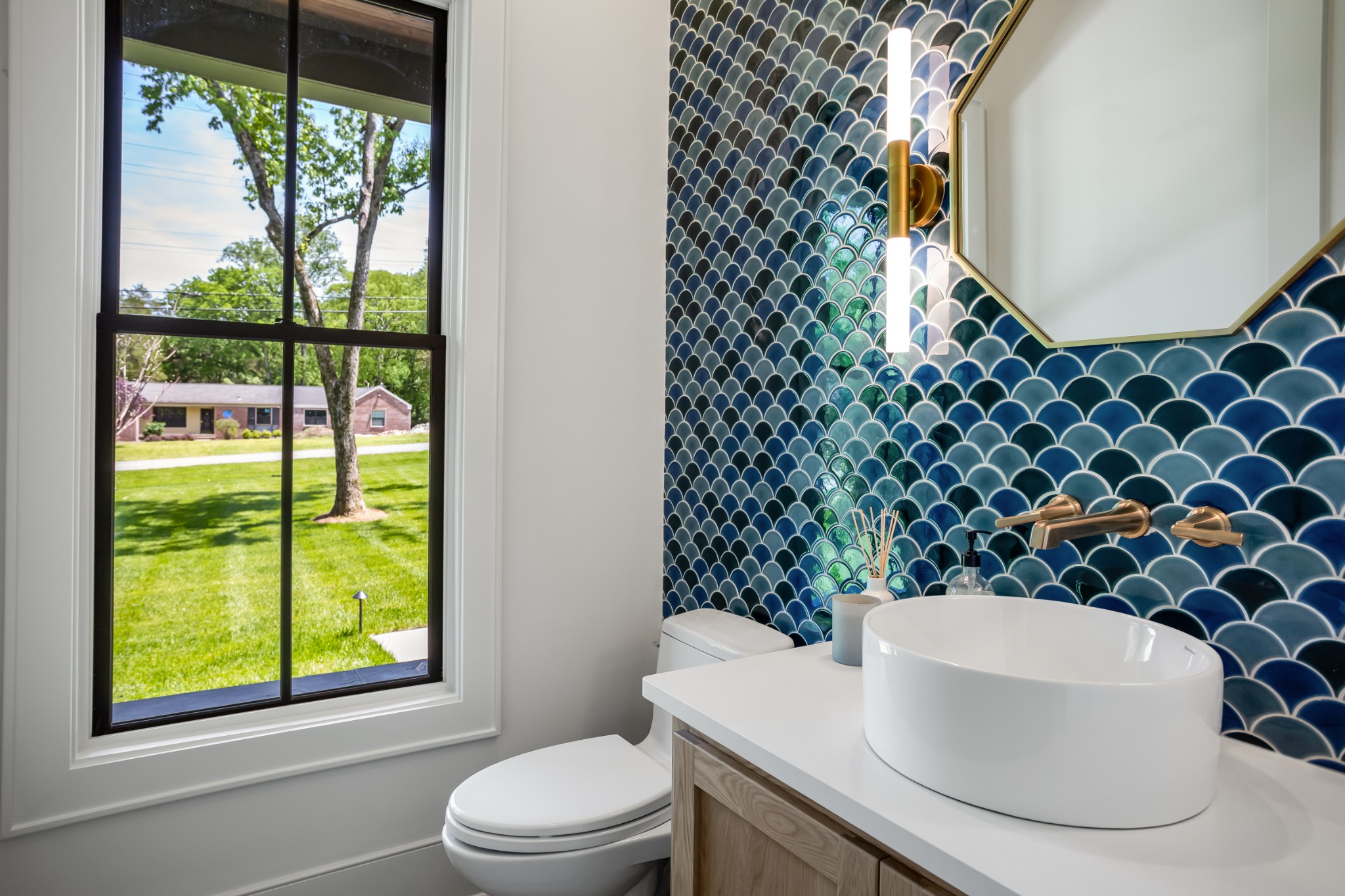 709 Brook Hollow Road Nashville, TN 37205 - Photo 24 of 55 a bathroom with a toilet a sink and a mirror