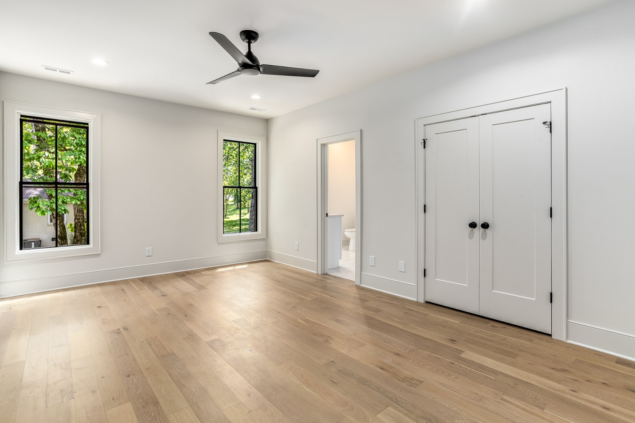 709 Brook Hollow Road Nashville, TN 37205 - Photo 40 of 55 wooden floor in an empty room with a window