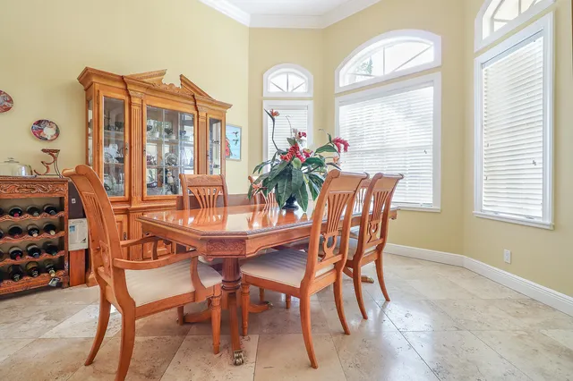 a kitchen with cabinets and window
