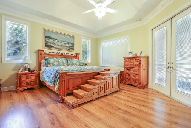 a bathroom with a sink a bathtub and a window