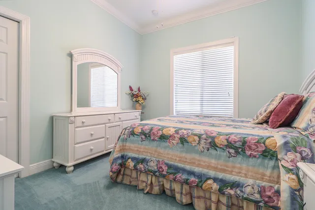 a view of a backyard with swimming pool