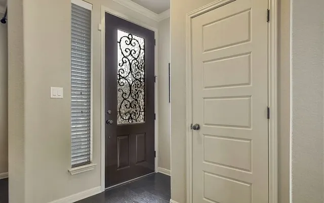 a view of front door with stairs
