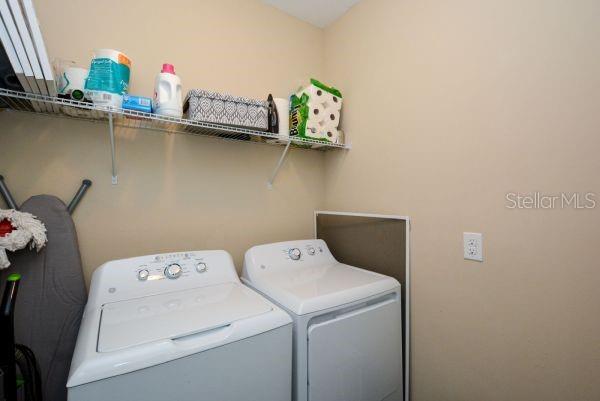 4212 Expedition Way Osprey, FL 34229 - Photo 22 of 28 a utility room with dryer and washer