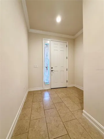an empty room with a bathroom