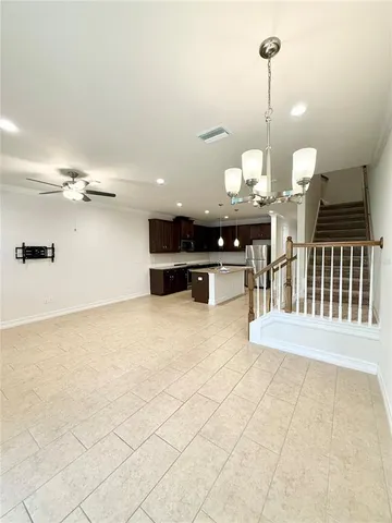 a view of an empty room with a large window