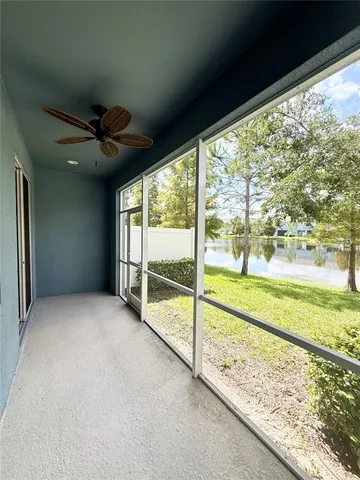 a view of a yard with large trees