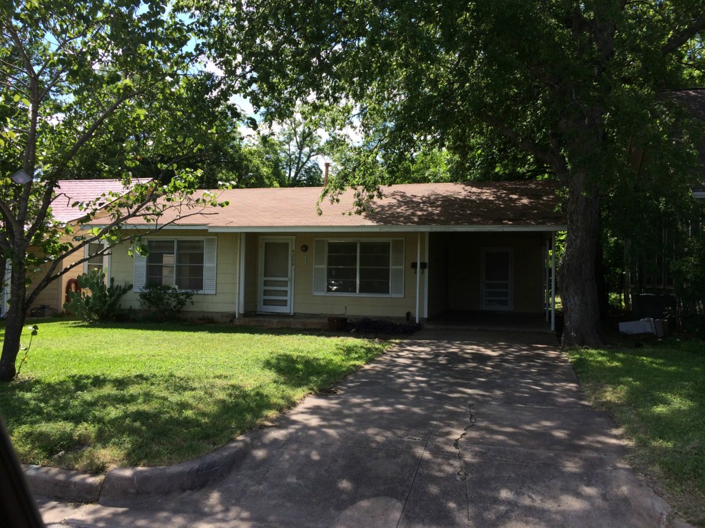 4208 Rosedale Avenue Austin, TX 78756 - Photo 1 of 1 a front view of a house with a garden