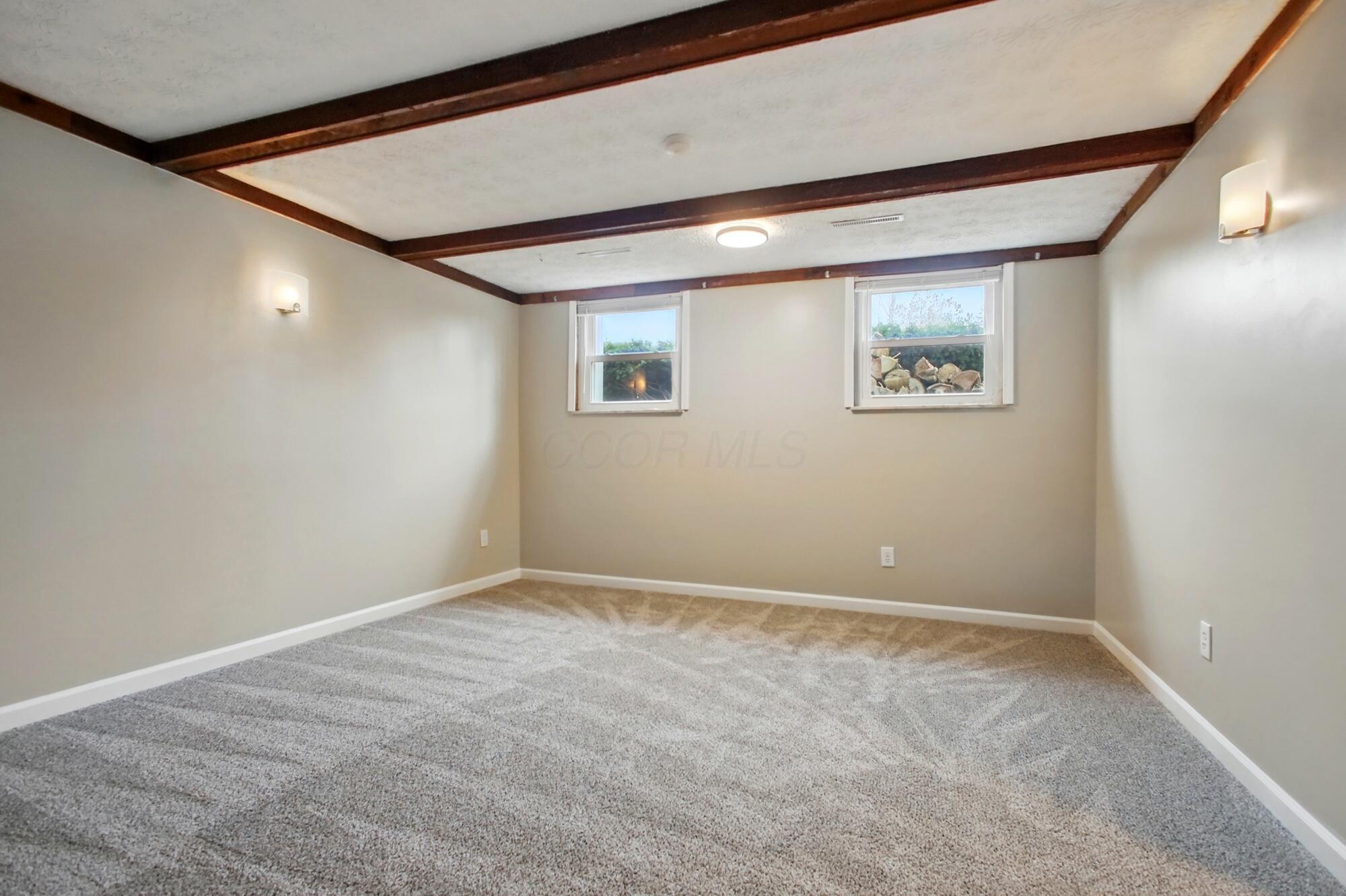834 Doherty Road Columbus, OH 43228 - Photo 35 of 55 Lower Level Living Room