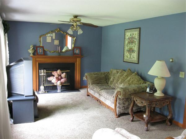 83 Pequot Road Southampton, MA 01073 - Photo 9 of 23 a living room with furniture and a fireplace
