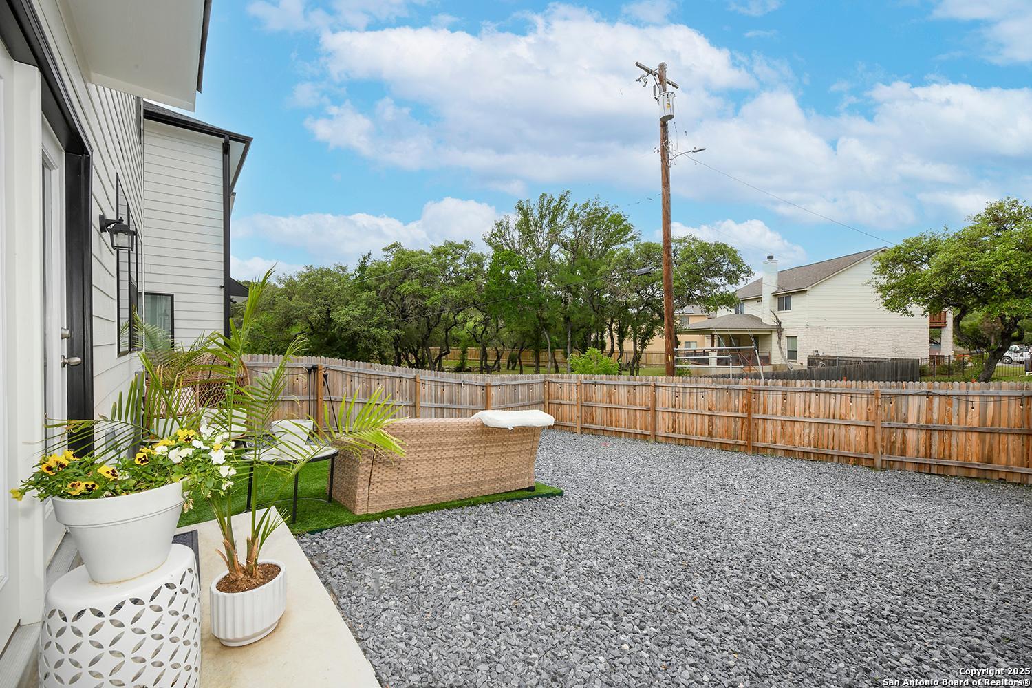 16011 Babcock Road, Unit 13 San Antonio, TX 78255 - Photo 23 of 25 a view of a backyard with plants