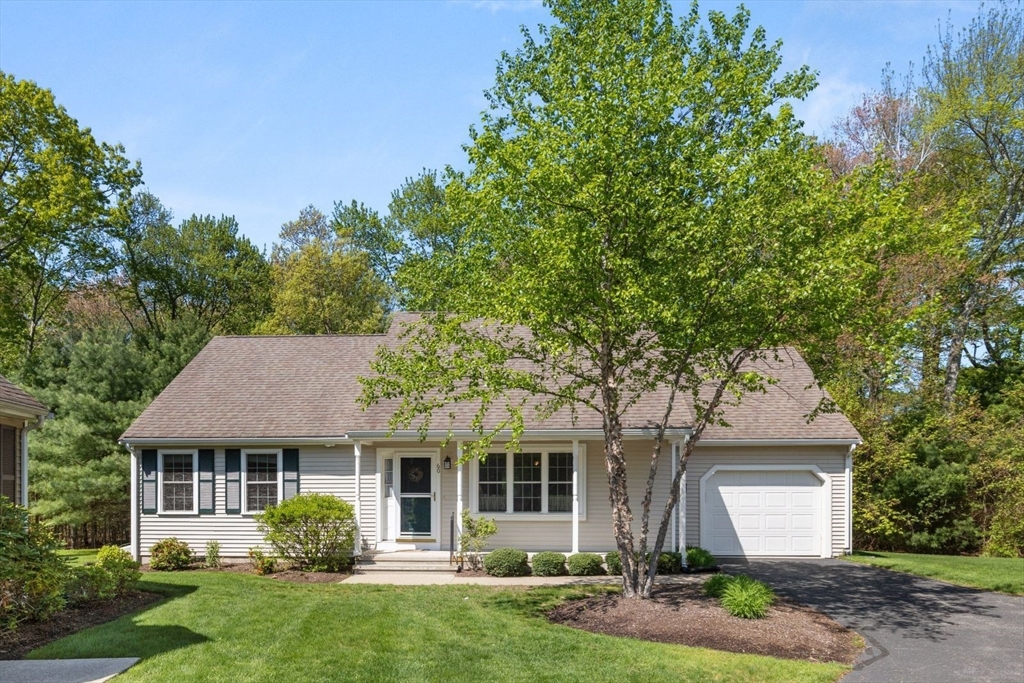 60 Brewster Road, Unit 60 Stoughton, MA 02072 - Photo 1 of 18 front view of a house with a yard